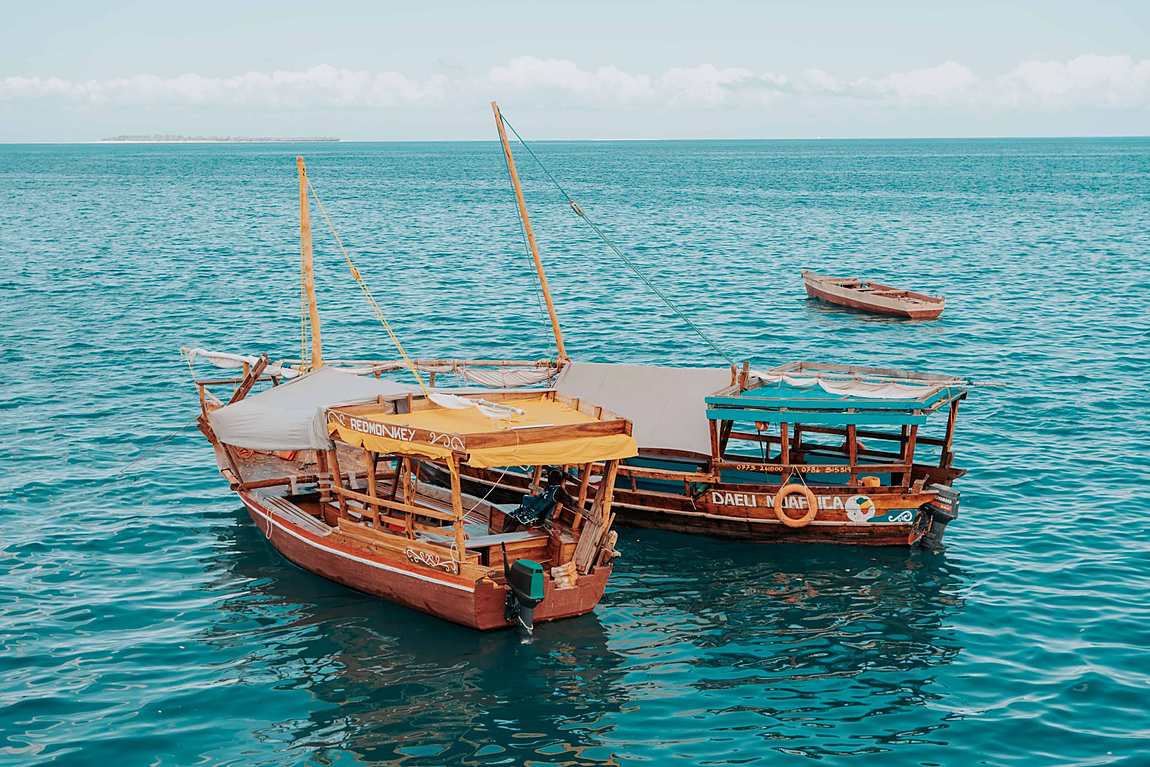 Wooden dhow on turquoise water